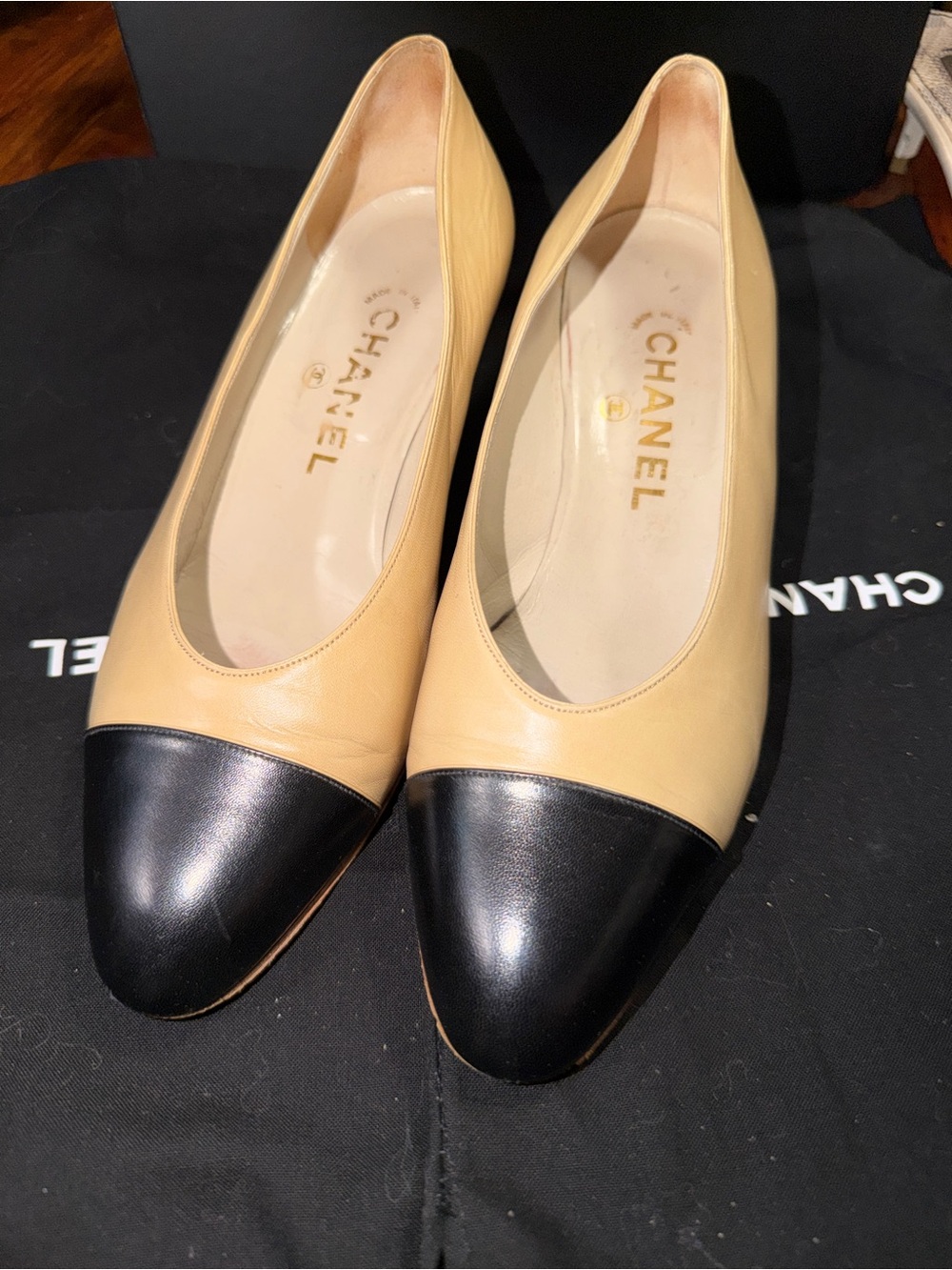 CHANEL Beige Leather Flats with Black Cap Toe